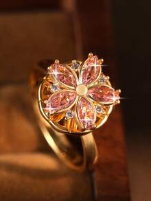 1 pieza Anillo elegante de cinco hojas de trébol rosa con baño de oro, flor de durazno giratoria, para cumpleaños, citas, compromiso para mujeres, anillo individual de cobre con circonita cúbica como regalo