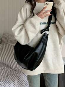 حقيبة جلدية ناعمة ذات سعة كبيرة بطيات هلالية بطراز رجعي، تتميز بأسلوب مريح وعادي وشامل، مثالية للتنقل كحقيبة كتف أو حقيبة متقاطعة الجسم.