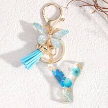 Fashionable Butterfly Tassel Flower Initial Keychain For Girl And Ladies, Blue Cute Dry Flower Dandelion Letter Key Chain, Backpack/Handbag Decoration Gift Bag Accessories Lanyards With Id Holder Car Accessories Bag Charms Christmas Car Accessories Teacher Friend Sister Gift Ideas