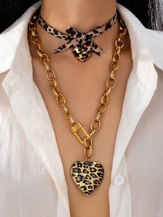 1 pieza Collar gargantilla con lazo de cinta con estampado de leopardo y 1 pieza Colgante de cadena grande dorada con dije de corazón - Conjunto de collares superpuestos con estampado animal para otoño e invierno