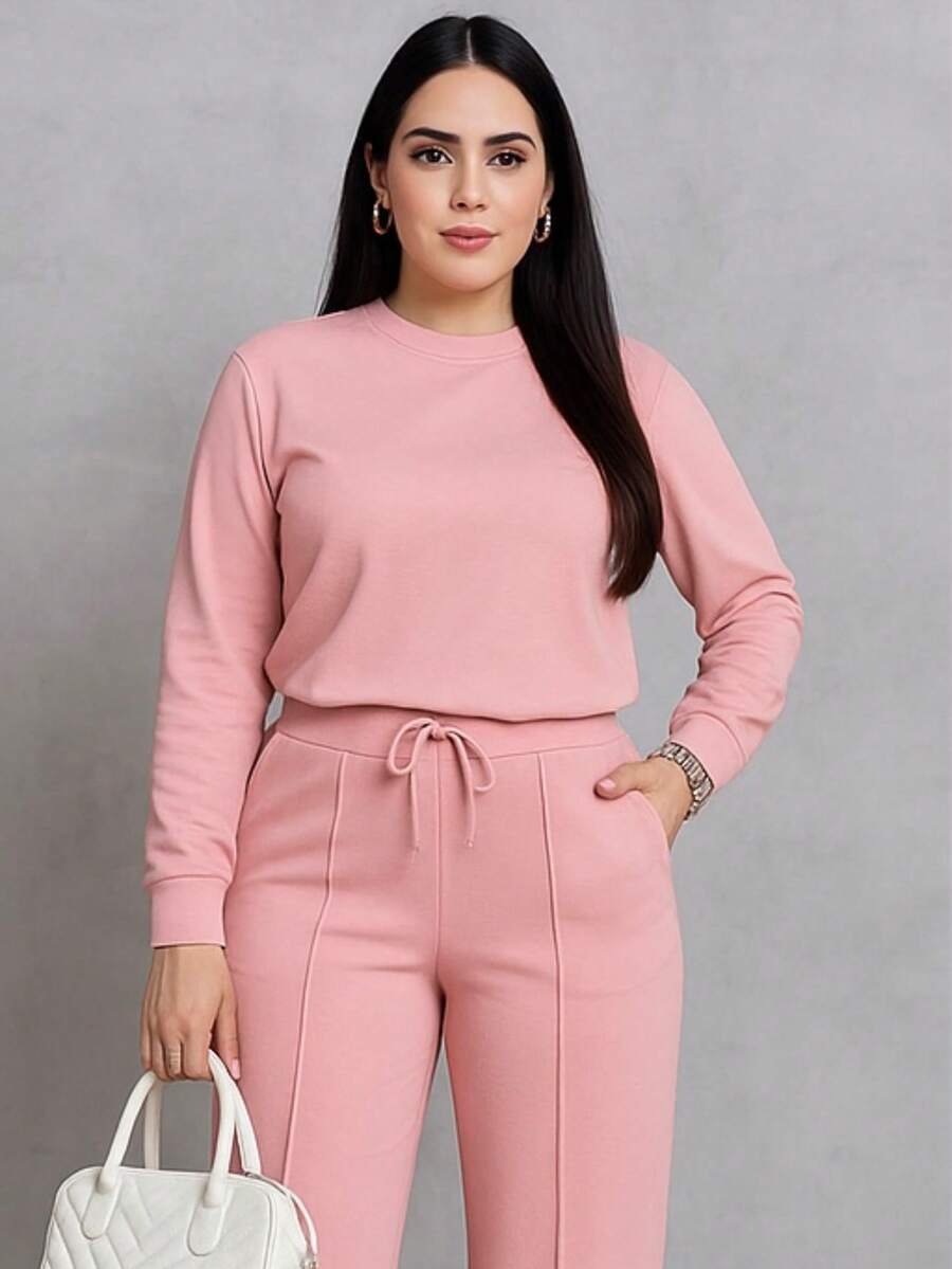 Traje 2 piezas casual de otoño que incluye blusa corta holgada y pantalones pierna ancha tipo pata elefante amplios y cordón en la cintura tela sin transparencias - Rosa - Ver 1