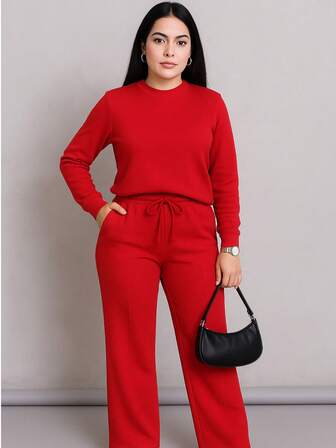 Traje 2 piezas casual de otoño que incluye blusa corta holgada y pantalones pierna ancha tipo pata elefante amplios y cordón en la cintura tela sin transparencias