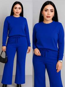 Traje 2 piezas casual de otoño que incluye blusa corta holgada y pantalones pierna ancha tipo pata elefante amplios y cordón en la cintura tela sin transparencias - Azul - Ver 4