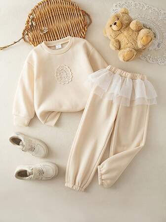 2 件套时尚年轻女孩运动衫套装，带蕾丝立体装饰，针织柔软舒适圆领厚运动衫和网眼裙袖口裤子，时尚休闲运动风格，非常适合秋冬季节、户外活动、学校、跑步、骑自行车和派对