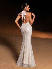 Faeriesty 奢华美人鱼亮片晚礼服，颈后饰有缎带蝴蝶结，裙摆飘逸——是红毯婚礼、优雅盛会、精致舞会和高端晚宴聚会等女士正式场合的理想之选。 - 杏色 - 查看 3