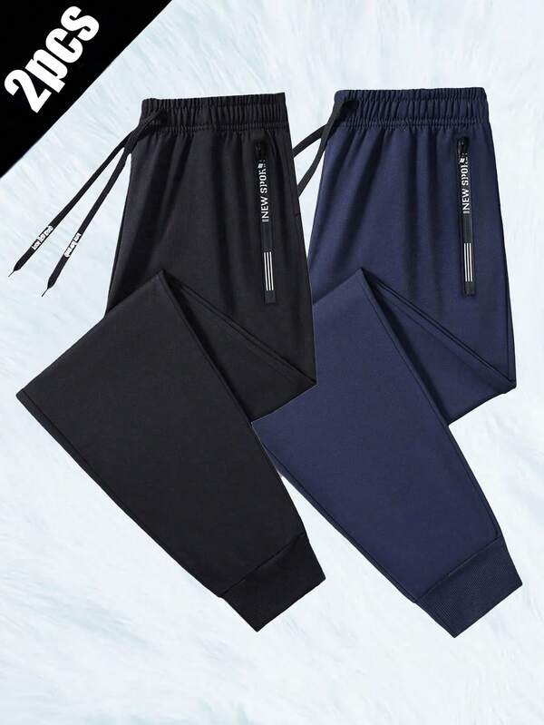 2 piezas Pantalones deportivos casuales con cintura elástica para hombre de talla grande, pantalones de chándal minimalistas y de moda en color negro para primavera