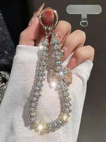 Colgante de llavero con oso/lazo de nudo con strass premium, cadena versátil anti-caída, decoración asimétrica de lazo de perla falsa, adecuado para teléfono, viaje al aire libre, compras, cordón anti-pérdida, correa de funda de teléfono de moda