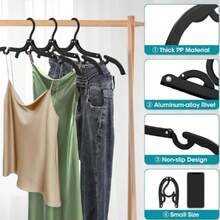 1/10pcs Portable Folding Travel Clothes Hanger With Storage Bag, Plastic Cruise Essential Garment Drying Rack, Suitable For Camping, Flight, RV, Europe Vacation, Black, Ultra-Compact, Space-Saving Design, Lightweight Yet Durable, Quick-Dry Organizer, Multi-Use Wardrobe Accessory For Luggage, Dorm, Backpacking, Caravan, Hotel Stay, Travel Kit Must-Have, Easy Clean, Non-Slip Racks, Foldable Hanger System For Garments, Shirts, Tops, Sleepwear And Soft Fabrics, Ideal Gift For Travelers And Vacation Enthusiasts - Black - View 1