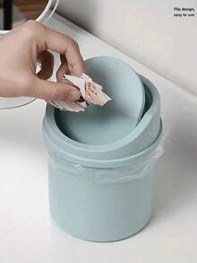 1 thùng rác mini có nắp, thùng rác để bàn nhỏ, giỏ đựng rác bằng nhựa, thiết kế nắp xoay giúp ngăn mùi hôi, dùng để đựng vỏ trái cây và giấy vụn giúp bàn làm việc gọn gàng, thích hợp cho phòng tắm, bàn làm việc tại nhà, bàn cà phê, văn phòng, phòng khách, phòng học, vật dụng cần thiết cho mùa tựu trường. - Nhiều màu - Xem 3