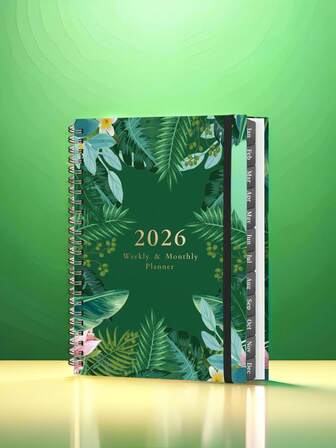 1本A5 2026铜版纸记事本 - 双线装订，内附口袋和松紧带。内含月历、年历、节假日安排和地址簿 - 适用于办公室、居家、学校和户外的一体化高效日记本。