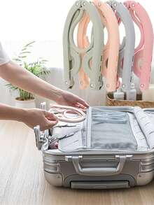 10/5/1 pieza Percha de ropa plegable y portátil para viajes - Diseño plegable que ahorra espacio, percha de plástico de varios colores, adecuada para equipaje, organización de armarios y esencial para viajes, ligera y fácil de plegar. Accesorio indispensable para cruceros, tendedero plegable que ahorra espacio, percha de ropa, estante de ropa para viajes (color aleatorio) Artículos esenciales para viajes, accesorios de viaje, vacaciones, verano, vuelta al colegio