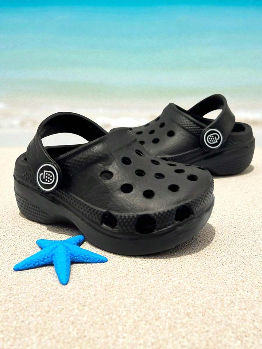 CLOGGS F.W. Sandalias Clogg Tipo zueco con cinta de ajuste al talón para Bebé Cómodas Antideslizantes playa o baño - Negro - Ver 1