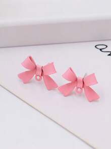 Pendientes de botón minimalistas con lazo elegante, joyería de alta gama