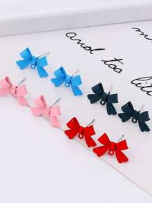 Pendientes de botón minimalistas con lazo elegante, joyería de alta gama