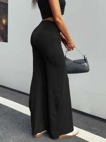 Calça feminina casual de cor sólida, tecido elástico alto, confortável, cintura em V, com bolsos laterais, perna larga e boca de sino