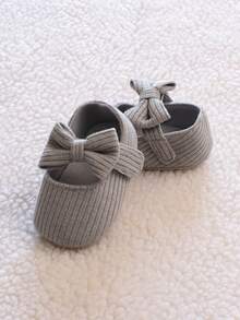 1 双女童蝴蝶结针织面料一脚蹬可爱平底鞋，适合春秋季节