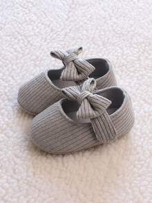 1 双女童蝴蝶结针织面料一脚蹬可爱平底鞋，适合春秋季节