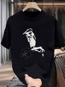 Camiseta gráfica de silueta de jugador de fútbol para hombres - Camiseta casual negra de cuello redondo con estampado atlético blanco, poliéster suave y elástico, lavable a máquina, perfecta para todas las estaciones, ropa para fanáticos del deporte| Camiseta de cuello redondo| Fi cómodo. - Negro - Ver 1