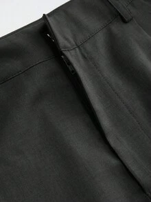 Vela Rue 极简设计连体裤，钩扣和拉链闭合，黑色修身阔腿裤，版型修身，适合所有季节