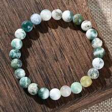 Pulsera elegante de cuentas de ágata de musgo, piedras redondas y lisas en tonos verde-blanco, ajuste elástico que se adapta a diferentes tamaños de muñeca, perfecta para un uso diario relajado que muestra delicadeza, joyería versátil para atuendos casuales