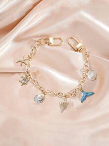 Ozean Charm, Ozean Taschencharm, goldfarbener Ozean Stil Taschencharm, dekorativer Zubehör, dekorative Taschenkette, Taschenverlängerung, Ersatzkette mit Charm, geeignet für Handtaschen, Shopper, Umhängetaschen, Schultertaschen, goldfarbener Ozean Stil Schlüsselanhänger mit Fischschwanz und Seestern Charm - elegantes Golddesign, modisches Taschenausstattung | Stranddekoration | Druckknopf