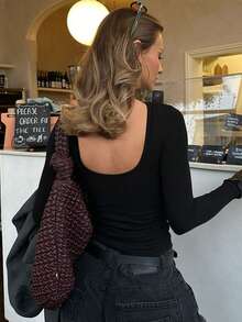 Nowy seksowny, dopasowany top z odkrytymi plecami i długim rękawem w jednolitym kolorze