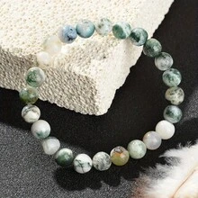 Pulsera elegante de cuentas de ágata de musgo, piedras redondas y lisas en tonos verde-blanco, ajuste elástico que se adapta a diferentes tamaños de muñeca, perfecta para un uso diario relajado que muestra delicadeza, joyería versátil para atuendos casuales