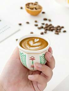 1pc Middle Eastern Style 100ml Ceramic Cup, Hand-Painted Coffee Mug With Elegant Blue, Red And Green Patterns, Complemented By "Peace" Latte Art, Displayed On White Surface With Coffee Beans And Pastries, Refreshing Visual Experience, Saudi National Day Gift - Multicolor - View 7