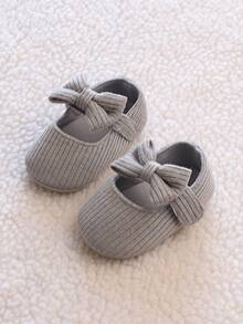 1 双女童蝴蝶结针织面料一脚蹬可爱平底鞋，适合春秋季节