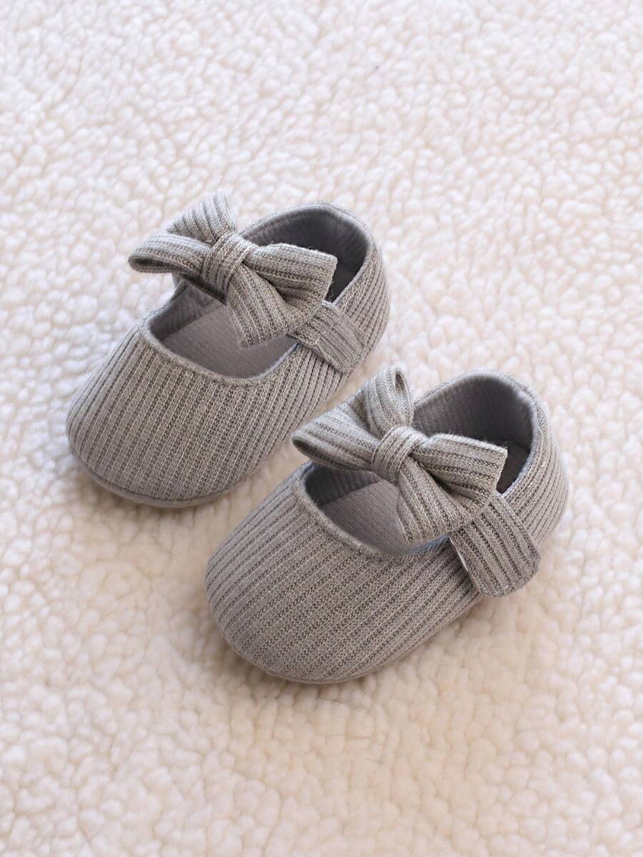 1 双女童蝴蝶结针织面料一脚蹬可爱平底鞋，适合春秋季节