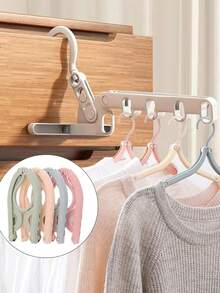 10/5/1 pieza Percha de ropa plegable y portátil para viajes - Diseño plegable que ahorra espacio, percha de plástico de varios colores, adecuada para equipaje, organización de armarios y esencial para viajes, ligera y fácil de plegar. Accesorio indispensable para cruceros, tendedero plegable que ahorra espacio, percha de ropa, estante de ropa para viajes (color aleatorio) Artículos esenciales para viajes, accesorios de viaje, vacaciones, verano, vuelta al colegio