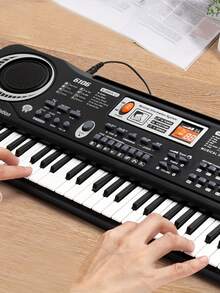 61键电子钢琴，带麦克风和USB接口，1.2厘米琴键尺寸，适合3岁以上儿童的入门级键盘，男孩女孩皆宜的音乐玩具，绝佳的圣诞节或生日礼物，61键黑色数码钢琴，适合早期学习，送给小音乐家的惊喜礼物