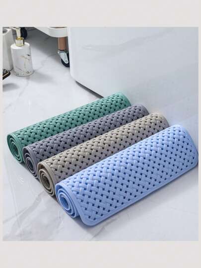 这款PVC防滑浴缸垫配有加大吸盘和排水孔，提供更强的抓地力，提升安全性。双面设计，可机洗。