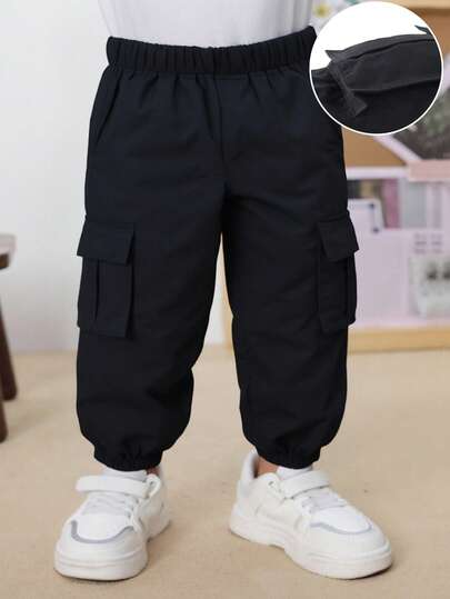 1 st småbarns casual enfärgade byxor med elastisk midja, lämpliga för utomhusbruk på vår och höst