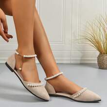 2025 Nuevas sandalias planas elegantes con puntera puntiaguda y decoración de perlas para mujeres, de unicolor, de plástico ABS, cómodas y versátiles, adecuadas para vestir, primavera/verano