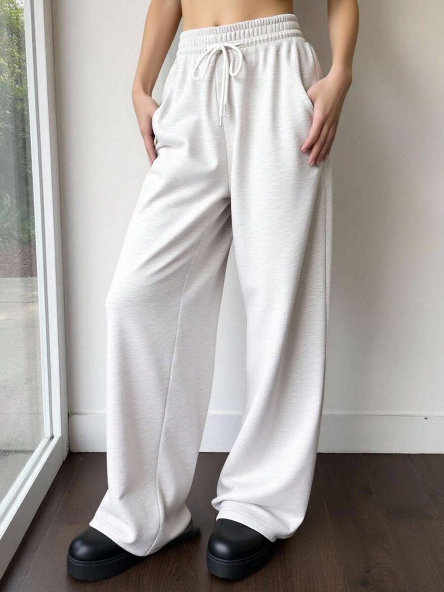 Quần nỉ nữ dáng rộng, dây rút, kiểu dáng mới Thu/Đông, lót dày ấm áp, họa tiết hoa màu xám nhạt, phong cách retro sinh viên, phù hợp cho thể thao, công sở, lễ tốt nghiệp, tựu trường và các dịp khác, cũng thích hợp cho giáo viên mặc. - Màu Xám nhạt - Xem 1