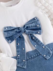 Young Girl Spring/Autumn White Puff Sleeve Round Neck T-Shirt With Bow & Pearl Decor, Paired With Elegant Casual Asymmetric Denim Skirt With Pearl Pocket Flap, 2-Piece Set Suitable For School, Outdoor, Commute, Vacation, Photography, Daily Wear