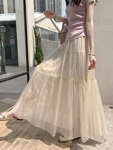 LuminousWealth 女士优雅纯色飘逸百褶A字裙，适合休闲或办公穿着，简约优雅 | 适合所有季节 春季 - 杏色 - 查看 3