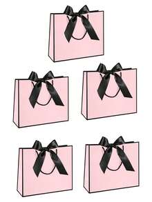 10个装 - 精致迷你礼盒 - 情人节、婚礼及各种庆祝活动的完美之选 - 适合盛放小礼物 - 饰以时尚的粉色和红色心形镂空图案，并配有LOVE字母丝带 - 是馈赠和派对装饰的理想之选