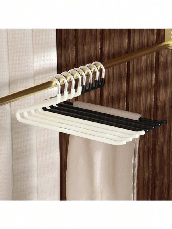 1 pieza Percha de pantalones con forma de cisne moderna y minimalista en negro y beige, un soporte de pantalones versátil para una organización eficiente del armario, una solución de suspensión portátil y ahorradora de espacio, con recubrimiento antideslizante para un almacenamiento de la ropa, ideal para entusiastas de la moda y organizadores del hogar, perfecto para refrescar el guardarropa estacional y como regalo festivo, mejora la estética de tu armario con elegancia funcional