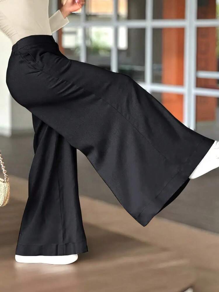 Calça feminina casual de cor sólida, modelagem ampla e solta, estilo primavera, elegante e minimalista, na cor preta. - Preto - Ver 6