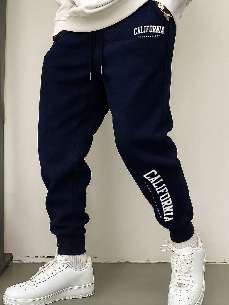 Quần thể thao nam in chữ, cạp chun, chất liệu mỏng nhẹ, có dây rút, thích hợp cho mùa thu/đông. - Màu xanh lam - Xem 1