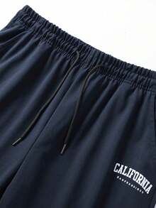 Quần thể thao nam in chữ, cạp chun, chất liệu mỏng nhẹ, có dây rút, thích hợp cho mùa thu/đông. - Màu xanh lam - Xem 4