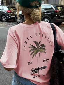 女士休闲圆领棕榈树字母印花度假风短袖T恤上衣，白色和粉色