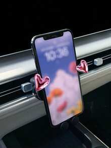 这款全新车载手机支架采用可爱的爱心卡通设计，是一款汽车出风口导航支架，可用于装饰车内环境。升级版银色PVC仪表盘出风口支架，专为女性设计，安装简便快捷，可拆卸、可水洗，能够牢固地固定在车内，适用于任何车型。可靠耐用，牢固嵌入。 - 黑色 - 查看 20