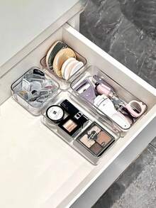 1/4/7/8/11 szt. Przezroczysty organizer do szuflady ze zintegrowanym schowkiem, wszechstronny organizer na przybory piśmiennicze i kosmetyki, idealny do przechowywania niezbędnych kosmetyków, artykułów biurowych, różnych przedmiotów, artykułów szkolnych, idealny na prezenty świąteczne, w tym na Halloween, Boże Narodzenie, Nowy Rok i Walentynki, ulepsz swoją przestrzeń dzięki funkcjonalnym i stylowym rozwiązaniom do przechowywania na każdą okazję, zmaksymalizuj organizację i estetykę w domu lub biurze, idealny do sezonowych dekoracji i wręczania prezentów, ulepsz swoje biurko i rutynę pielęgnacyjną dziękiniezbędnemu koszowi do przechowywania.