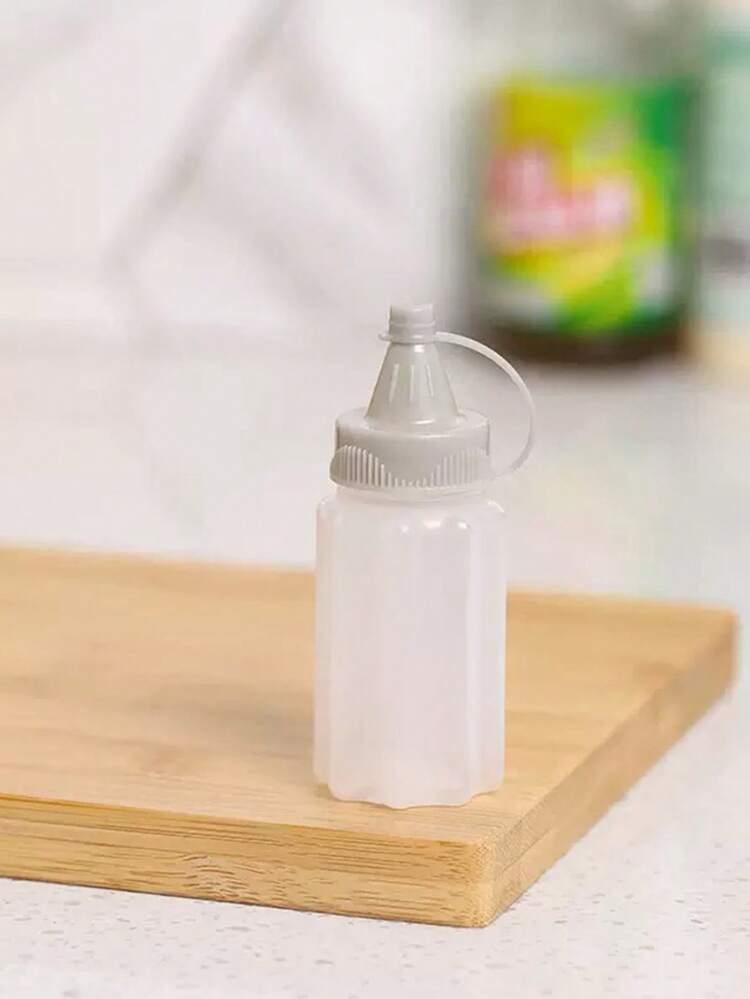 4个装迷你挤压瓶适用于罐装调味盒，酱料储存瓶，便携式PP材质调味瓶挤压瓶，易于清洗，方便便携，适用于上班族，学生，儿童，学生宿舍，厨房调味品储存。 - 多色 - 查看 4