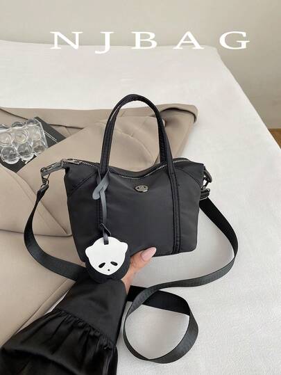 时尚通勤包，极简休闲单肩包，轻盈斜跨饺子方形女包。极简尼龙方形手提包，时尚手柄钱包，配有可拆卸肩带，适合女生、女大学生、初学者和办公室女士，非常适合办公室、大学、工作、商务、通勤