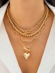 Un conjunto de 4 collares con colgante en forma de corazón clásico y elegante con cuentas, cadenas claviculares con cierre geométrico en forma de OT. Joyería de oro multicapa y apilable, un conjunto de collares pasional y romántico para damas. Adecuado para uso diario y fotografía de citas. Las cadenas se cortan según la longitud y el número de secciones no es fijo.