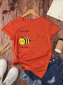 Camiseta con estampado de eslogan y abeja "No te preocupes, sé feliz", camiseta básica de hombros caídos, camisetas gráficas de tallas grandes para mujer
